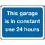 This garage is in constant use 24 hours Sign